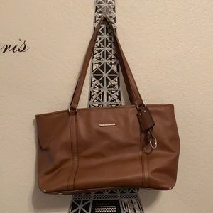 A brown shoulder bag